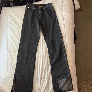 New, super cute light washed straight leg jeans with slits!